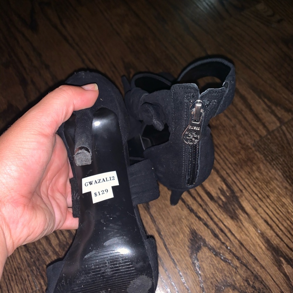 Strappy black guess heels with bow.